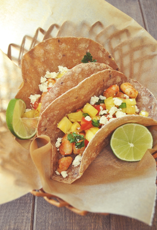 Chipotle shrimp tacos with pineapple-jalapeno salsa + cotija cheese